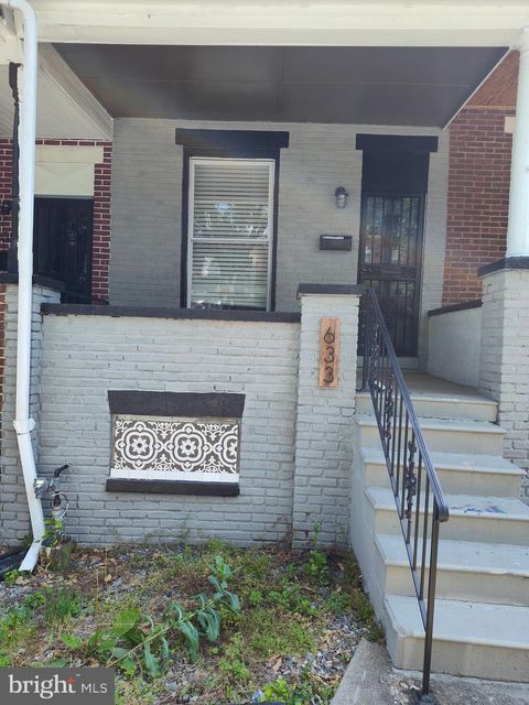 Photo of 633 E 30th Street, BALTIMORE, MD 21218 (MLS # MDBA2188798)