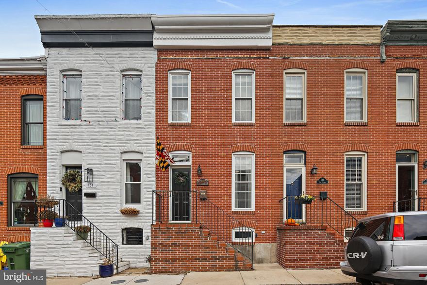 If You Are Looking For All The Charm A Baltimore Row Home Brings—Look No Further. Parking Pad, Roof Top Deck, Finished Basement + So Much More. Main and Upper Levels Boast Original Hardwood Floors And Exposed Brick Walls. Spacious Living Room Features Fireplace With Mantel, Natural & Recessed Lighting & Open Concept Flow To The Dining Room. Dining Room Holds Large Table And A Rare Extra Window That Brings In Even More Light. Kitchen Boasts Granite Countertops, Stainless Steel Appliances & Plenty Of Room For An Island. RARE First Floor Powder Room And Laundry Room with Great Storage. Access Door To 1 Car Parking Pad In Rear. Upper Level Features Two Primary Suites, Both With Upgraded Bathrooms & Ceiling Fans. Large Closets In Both Along With A Hall Linen Closet! Access To Two-Tiered Deck Overlooking Best Of Baltimore Views. Parking Pad + Easy, Ample Street Parking. Close Proximity to Great Restaurants, Entertainment and Shopping! Transferrable Home Warranty - Good Through 6/30/24! Make An Appointment Today!