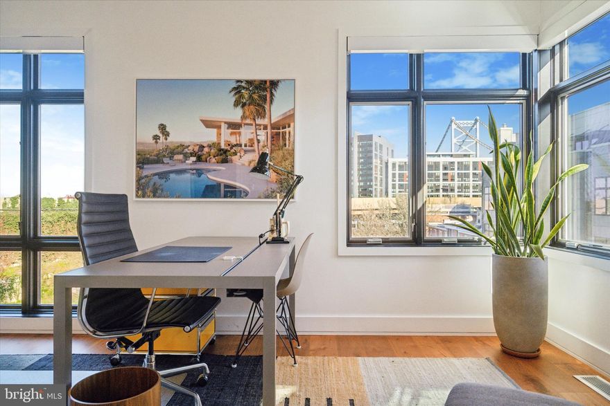 Discover luxury living at its finest in Old City Philadelphia, with this remarkable 4 bed, 5 bath corner home in the prestigious Baldwin Luxury Townhome Collection. Situated across from a scenic neighborhood park, this home offers breathtaking views of the city skyline and the iconic Benjamin Franklin Bridge.

Boasting a 2 car garage, 2 gas fireplaces, and impressive features such as soaring 12-foot living room ceilings, multiple balconies, and a stunning rooftop garden, this residence is the epitome of sophisticated urban living. Equipped with smart home technology controlled your mobile device this home has 2 Nest thermostats and Russound keypads for 6 different audio zones, convenience and modern luxury converge seamlessly in this corner townhome. 

Upon entry, a well-appointed den with a half bath provides a seamless transition home from either the street or oversized garage. The open floor plan of the second floor, accented by wide plank walnut flooring, features spacious living and dining spaces with a wet bar, gas fireplace, and access to a beautiful balcony with privacy planters.  Natural light is a striking feature of the home, with 3 exposures of oversized windows and large sliding glass doors. The kitchen is a chef's dream, showcasing luxury appliance brands such as Gaggenau and Thermador, custom Italian cabinetry, quartz countertops, and incredible unobstructed views of the park and Ben Franklin Bridge.

The third floor is dedicated to a lavish owner's suite with panoramic views, two walk-in closets, and a spa styled bathroom filled with natural light, radiant heated floors, a Porcelanosa soaking tub, dual sinks and an oversized tiled shower.    An additional bedroom with custom built-in beds, desk, and storage as well as a laundry pantry completes this level.

The fourth floor offers two additional large bedrooms, one with a private balcony and walk in closet, as well as a second full bathroom with premium fixtures.  A second wet bar with a built-in wine/beverage refrigerator adds to the entertainment convenience of this home, as you pass it on your way up to  the rooftop garden with an inviting stone patio, gas fireplace, outdoor speakers and custom planters with irrigation systems.  Expansive daytime and evening views of the city, sky and Ben Franklin Bridge make entertaining and dining on the roof an absolute delight.

For added flexibility, the finished lower level has a full bath with radiant heated flooring ,providing space for guests, a home gym, or a movie screening room. 

With easy access to major roadways and proximity to the vibrant offerings of Old City, 300 N 2nd Street presents the perfect blend of urban sophistication and accessibility.  Don't miss the opportunity to own this exceptional urban oasis that seamlessly combines luxury, location, and lifestyle.