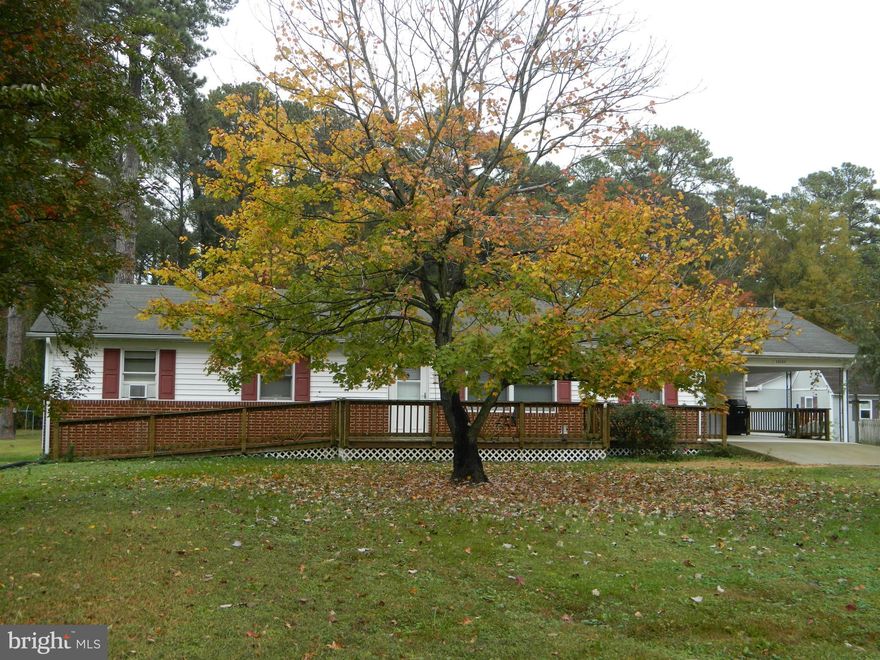 Nice rambler with close access to marina, and water.  Home is being sold as-is, but in great condition.  3 bdrms, 2full bths, front LR, KT w/ dining area. Office/Den off kitchen.  Pergo floors throughout most of home.  Nice sized yard.