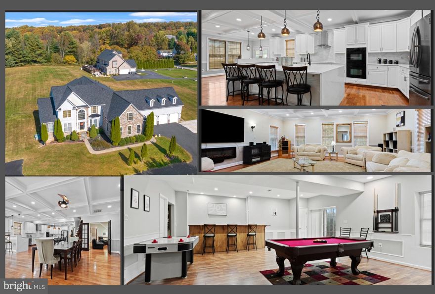 Welcome to this exquisite 2003 stone front colonial home, boasting almost 8,400 square feet of living space spreading across three levels of architectural excellence. With two owner's suites, one conveniently located on then main level and another one on the upper level. As you step inside, you'll be impressed by the incredible inviting setting boasting natural light, nine-foot ceilings trimmed with crown molding on first and lower levels, gleaming hardwood floors throughout the main level, a living room where you can enjoy reading your favorite author, a formal dining room with a powder room on the west side of the home and another powder room on the east side next to the garages. Stunning two level family room with coffered ceilings, wainscots, and dramatic stone fireplace. A fabulous game room with coffered ceilings on this same level, perfect for entertainment. A mud room next to the laundry room takes you to the 3-car garage. The heart of the house welcomes you with an open floor plan. Embrace your inner chef gift and awaken your culinary joy creating memorable gatherings and entertainment to your guests in the amazing kitchen with 42" cabinets, hood, with a huge quartz waterfall island, a second family room/breakfast room with gas fireplace and sliding doors leading to a huge two tier TREX deck. On the upper level, six additional bedrooms including a 2nd owner's suite. The serene owner’s suite offers tray ceilings with accent lights, unfolds a separate sitting area and a luxury bathroom with soaking tub, separate shower and huge walk in closet. The lower level features a restaurant style bar, gym, billiards area, movie room, 8th bedroom , and another flex room for entertaining and walk out through sliding doors.  SEE VIRTUAL TOUR
Extensive $450,000+ renovations. Updates include: Roof (2023), Coffered ceilings (2022), Kitchen renovation (2022), Addition (2010), Well pumps and filtration system (2024), New HVAC (2025).