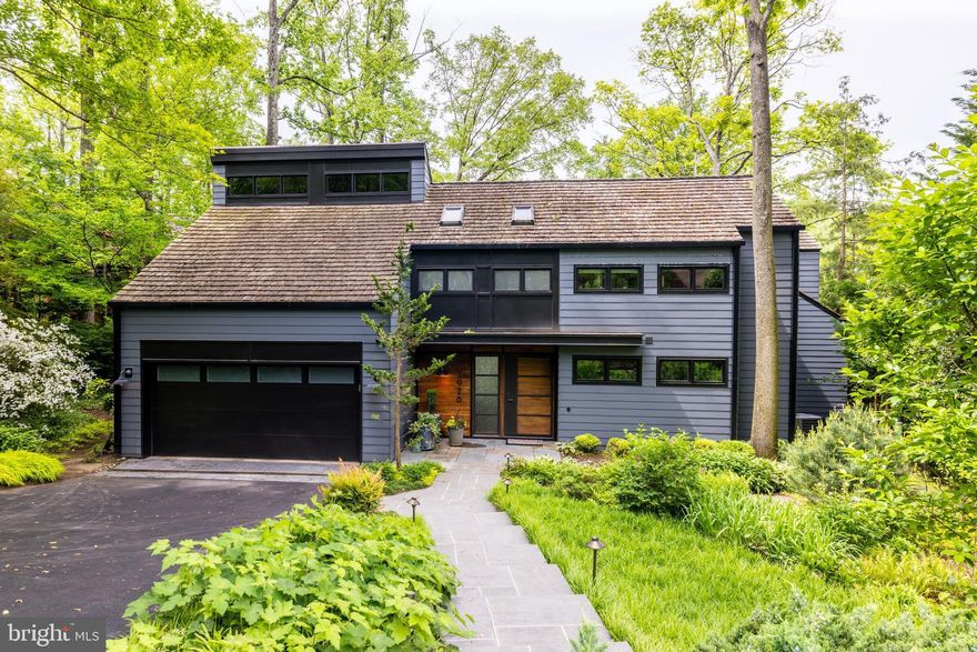 Offer deadline Monday, June 3rd at 7pm. The sellers reserve the right to accept an offer prior to the deadline. They will be presented as they come in.

Rare opportunity to purchase a showcase residence on Lake Thoreau! Property Collective proudly presents 1926 Upper Lake Drive, a modern industrial masterpiece in Reston, Virginia. Professionally designed and featured in Lauren Liess’ second book, Down to Earth, this property has undergone a full-home renovation and expansion under the expert direction of Rill Architects and Woodhaven Contractors. The result is a one-of-a-kind lakefront retreat with breathtaking views – A peaceful escape and the perfect blend of luxury design and elevated living.

The exceptional interior that has been completely reimagined to flood the home with light and bring the surrounding nature in. An industrial aesthetic complements the contemporary architecture throughout with elements like exposed steel post and beams, punched-metal railings, hickory floors, soaring windows framing views of Lake Thoreau, planked ceilings, a staircase inspired by an early-1900’s design and subtle maritime details. The high standard of quality craftsmanship and finishes is undeniable from the very first moment you step inside the home.

The hardworking kitchen is beautiful and functional for both quiet daily enjoyment and lively gatherings alike. It features handpicked elements like a soapstone sink and counters, vintage factory lights, top of the line appliances and a massive butcher block island with seating for 6. A combination of white oak, glass front and richly painted cabinetry, floating shelves, a subway backsplash and an industrial brass faucet add to the collected and authentic style.

The main living spaces seamlessly flow between the kitchen, great room and dining room with large sliding doors that allow life to spill outdoors. The impressive natural stone patio offers epic lake views and all the elements necessary for epic entertaining - A built-in grill, high top table seating, lounge areas, a plunge pool with waterfall feature, lighting, professional hardscaping, landscaping and private dock for direct access to countless activities on the lake.

Back inside, the floor plan is efficient and thoughtfully laid out offering a main level bedroom suite with patio access, a flexible private office space and three additional bedrooms upstairs. There are delightful touches at every turn including a cozy library loft, built-in benches and shelves and relaxing daybed seating on the balcony overlooking the great room. 

The primary bedroom is intentionally designed to put the focus on the powerful simplicity of the architecture and views of the lake. In the primary bath, his and hers vanities with custom marble shelf backsplash details and features like heated hexagon floors, a steel and glass shower door and a separate soaking tub create a vibe of modern mixed with vintage nostalgia. 

Located directly on the water on Reston’s desirable Lake Thoreau and minutes to Tysons Corner, I-495 and Dulles Airport, this is a true lifestyle property that even the most discerning buyer will find to be a meaningful and unique place to call home. Notable publication features include: The Washingtonian, Home and Design magazine, the Washingtonian and Lauren Liess’ second book, Down to Earth. Welcome home!