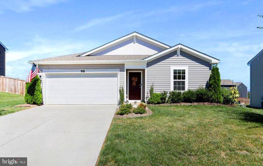 Desirable  4 bedroom 2 bath ranch  style home for  easy  one level living!  Built in 2021, this home  has been well-maintained.  Move-in ready with fresh paint and  has been deep cleaned!   The bright, open living room, kitchen and  dining combination offers large windows and slider door to the backyard.  The gourmet kitchen features elegant granite counters, a generously sized  island, stainless steel appliances, and a pantry, all to appeal to the chef in the house!  The primary bedroom is spacious and offers  a ceiling fan prewire, attached full bath, with shower  and walk-in closet.  The living area flooring is LVP  and the bedrooms have  carpet. The house  package is complete with a two car garage (also painted!)  and garage door opener.  Driveway can accommodate multiple cars. It features Energy Star appliances and smart home technology. Conveniently located on commuter route to Virginia.  Comcast internet available.