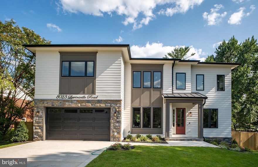 OPEN HOUSE JANUARY 4, 2026  SUNDAY 2 PM to 4 PM.  New Home for the New Year! Welcome to this stunning home with 6 Bedrooms, 6 Bathrooms and 2 Half Baths in the prestigious McLean Hamlet! Exquisite open concept living redefined in this sleek and sophisticated modern design by Bella Home Construction boasting  over 7300 square feet of three finished levels on a beautifully landscaped 0.37-acre lot. Enjoy unmatched convenience of walking just a few doors down to Spring Hill Elementary school and a quick access to the Silver Line Metro and bus routes.

This home is beautifully designed for both everyday living and grand entertaining.  From the moment you arrive, a charming front porch welcomes you into a dramatic, light-filled open layout featuring 7.5” wide European oak floors, 6" Baseboard, 10 ft ceilings on the main level, 9 ft upper level and lower level. Rich wood accent walls add warmth and texture throughout. 

The main level boasts an expansive family room with tray ceilings and LED lighting, gas fireplace and it opens to a gourmet chef’s dream kitchen, complete with a oversized quartz island, luxury top-of-the-line stainless steel Jenn-Air appliances, under cabinet and floor lights, butlers pantry and a walk-in pantry. Entertain in the elegant formal dining room, complemented by a versatile office or guest suite with a full bath. The bright breakfast area flows effortlessly into the family room and out to the deck, creating the perfect setting for indoor-outdoor gatherings. A stylish mudroom and a doggie spa bath center—accessible from both the kitchen and the garage—enhance the home’s thoughtful design.

On the upper level retreat, the lavish primary suite is a true sanctuary with heated floor in the spa bath, a spectacular 2-person rain shower, a free standing oversized 72” soaking tub , double vanities, a dedicated makeup area and 2 oversized custom walk-in closet. Three additional bedrooms, each featuring a private en-suite bath and generous closet space, provide the perfect blend of comfort and sophistication.  A spacious, dedicated upper-level laundry room is equipped with a front-loading washer and steam-sanitize dryer.

The lower level utilizes the open floor plan to maximize living space and functionality, with a bedroom suite, large recreation room, wet bar and wine cooler, theater, studio/gym and additional half bath. The gas fireplace is an extra added bonus for those cold winter months. 2 car garage and a 240V electric vehicle charging outlet. . Home is located minutes away Tysons Corner Center, Tysons Galleria, Capital One Hall, Wolf Trap, Great Falls National Park, and many more. Located inside the beltway with access to I-495, Route 7, Route 123 and Dulles Toll Road.