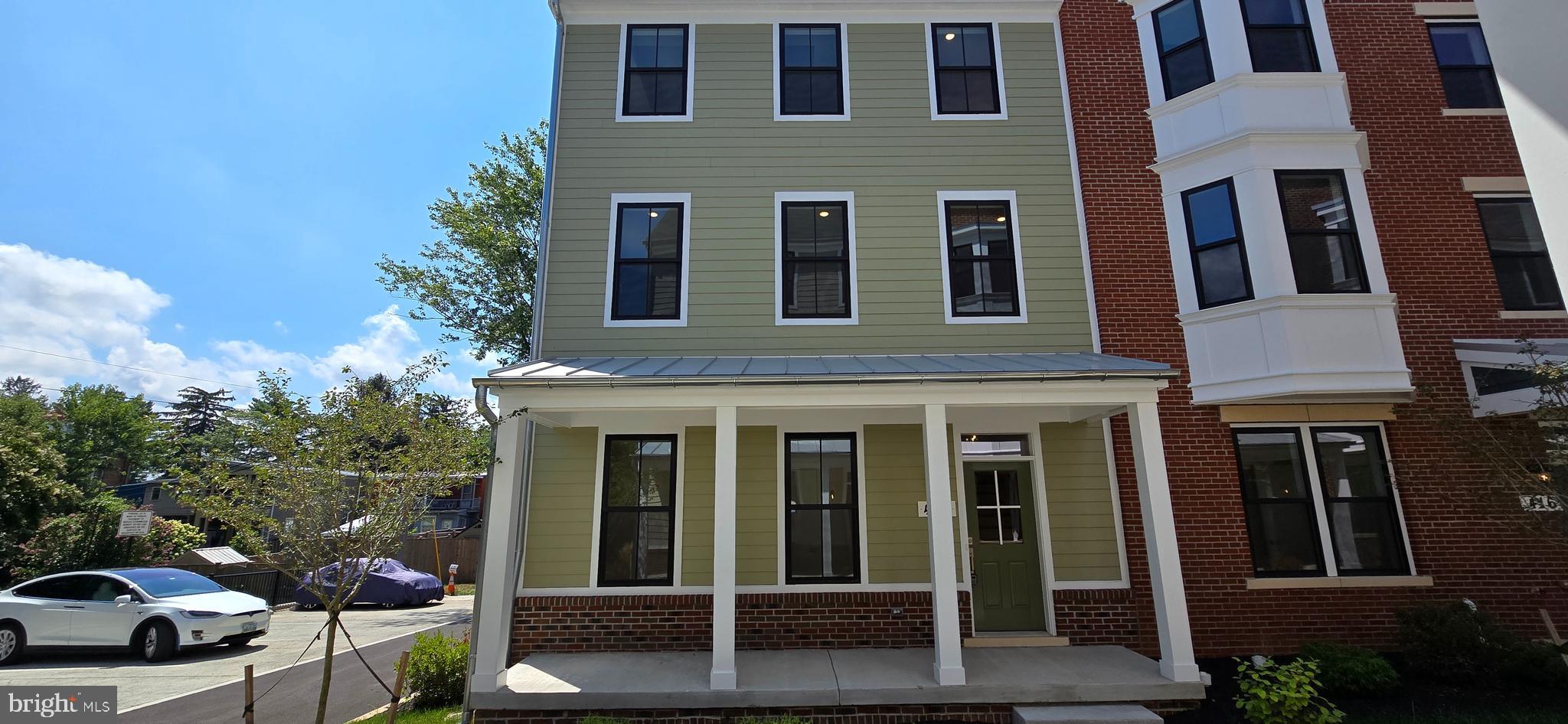 ONE OF A KIND RENTAL — Welcome to Frederick’s newest crown jewel, Chapel Alley! This end-unit, new construction, 3-story townhouse—the largest in Frederick—offers a rare opportunity for luxury living in the heart of picturesque Downtown Frederick, just steps from the city’s best dining, shopping, and entertainment. No detail was overlooked and no expense spared in crafting these one-of-a-kind homes. The striking exterior features red and black brick, composite black casement windows, custom iron railings, galvanized gutters, full divided light doors, and Hardie plank siding. Enjoy two private parking spaces, a fenced backyard, a utility balcony, and professional landscaping. Inside, the open-concept layout is anchored by a chef’s kitchen with natural quartzite stone countertops, a waterfall island, double oven, cooktop, built-in refrigerator with craft ice, and custom cabinetry with glass accents and built-ins—including a dedicated stone-topped kitchen desk. The adjacent dining and family room showcase a dramatic fireplace surround and built-in storage, with a balcony for fresh air just steps away. The primary suite features dual custom closets, a Juliette balcony, and a spa-like bath with natural black stone countertops, a black soaking tub, dual shower heads, and designer lighting. All baths feature floor-to-ceiling designer tile and premium fixtures. The top-level penthouse, with its own mini-split, includes a built-in bar, half bath, and sweeping views. This is Downtown Frederick luxury living at its finest—spacious, stylish, and truly one of a kind.