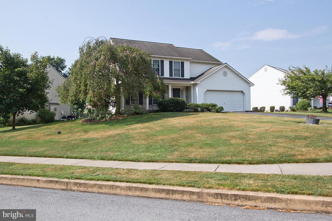 Charter-built 2-story on corner lot. Sunroom has vaulted ceiling and French doors to kitchen. Family room has a gas fireplace and is open to the large kitchen. Formal dining room features chair-rail and picture-frame lower trim. Rec room in the lower level is finished with wainscoting, chair-rail molding, and dry-bar. Home also features 2nd floor landing w/linen closet, radon system, water softener, Bilco basement doors, stamped concrete patio,