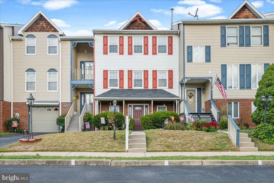Welcome home to this beautifully renovated townhome in Kenly Square! The original owner has lovingly maintained and recently improved this home to meet today's standards. As you approach, you immediately notice the charming front porch and great scale of the home. Enter to a cozy living room with new LVP flooring and ease of access to the kitchen and dining room. The kitchen has ample cabinetry, gas stove, great counter space and ease of access to dining room. The dining room leads to the rear patio and great feel of rear yard space.  The first upper level features an incredible light-filled family room/rec room. This great flex space could be a play room, theatre room or office space. This level features the primary suite as well. The primary bedroom has an en-suite bath and ample closet space. The second upper level has two bedrooms that are very spacious. They feature new carpet and a shared full bath. The ENTIRE home has been freshly painted with new light fixtures and is completely move-in ready. Enjoy ease of access to Route 40/70/81. The HOA covers snow removal, lawn mowing, trash and is a reasonable fee. Welcome home!