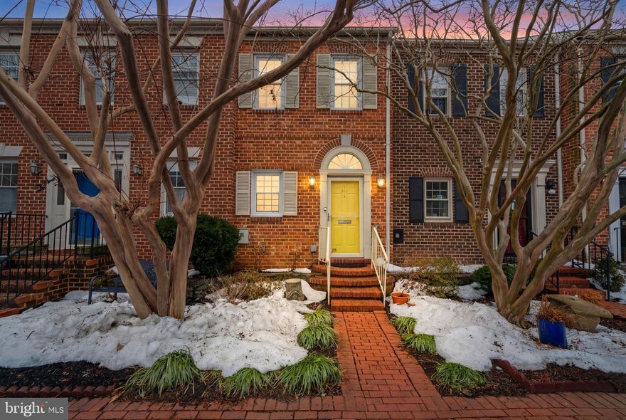 Waterfront Charm and sophistication in the Heart of Old Town! Discover a rare gem in the historic heart of Old Town Alexandria. This refined townhome masterfully balances timeless architectural character with contemporary updates.
The Main Level: Light & Artistry. 
Step through a dramatic two-story foyer into a home defined by white oak hardwood floors and intricate custom millwork. The sun-drenched living and dining area serves as the home's centerpiece, anchored by a cozy wood-burning fireplace and soaring ceilings. A stylish powder room completes the main level, making it as functional as it is beautiful.
The Owner’s Suite: Sanctuary with a View.
The second level is dedicated to comfort and views. The primary suite offers a serene escape, featuring expansive windows that bring in ample natural light. The contemporary bath allows breathtaking views of Founders Park and the waterfront. Enjoy the convenience of ample closet storage and a discrete, upper-level laundry station.
Outdoor Elegance.  Extend your living space into the private, red-brick paved patio. Fully fenced for ultimate intimacy, this "outdoor room" is a picturesque backdrop for dinner parties or a quiet morning espresso in the salt air.
The Opportunity: Limitless Potential. Venture to the top floor to find a spacious, high-character attic awaiting your vision. Already boasting a solid structural foundation and unique elevation, this "bonus" level is primed & has the capacity to be transformed into a third bedroom, executive home office, or media loft. This is a rare chance to add significant square footage and immediate equity to a premier Old Town address.
Location: The Best of Old Town! Parkside Living: Steps from the lush greenery of Founders Park, with easy access to bus route and metro.
Waterfront Access: Direct proximity to the Alexandria docks and river paths.
Historic Charm: A short stroll to the iconic boutiques and award-winning dining of King Street.
