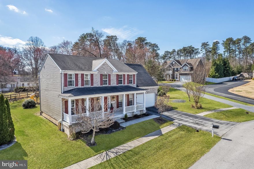 Welcome to this elegant and move-in ready Ryan Homes Bainbridge model, ideally situated on a private 0.56-acre wooded lot in the Willow Woods community of Severn. Offering over 3,800 square feet of living space, this home combines refined finishes, a versatile layout, and a peaceful, scenic setting.

One of the most exceptional features of this home is the rare upper-level design, featuring five bedrooms and three full bathrooms upstairs — a highly sought-after layout that provides flexibility for multigenerational living, guest accommodations, or work-from-home needs.

The main level offers a bright, open floor plan with 9-foot ceilings, abundant natural light, and upgraded hardwood flooring. The gourmet kitchen is thoughtfully designed with granite countertops, a large center island, upgraded cabinetry, and stainless steel appliances, seamlessly connecting to a spacious vaulted sunroom with tranquil views of the wooded backyard. Additional details such as crown molding, chair rail accents, recessed lighting, and a cozy fireplace elevate the living and entertaining experience.

Upstairs, the cathedral-ceiling primary suite serves as a true retreat, complete with a soaking tub, separate walk-in shower, and dual-sink vanity. All bedrooms feature generous space, new carpeting, and with a convenient upper-level laundry room.

The finished lower level expands the home’s functionality with a full bathroom and flexible space ideal for a recreation room, home theater, gym, guest suite, or additional living area.

Step outside to enjoy the expansive, tree-lined backyard offering privacy, strong curb appeal, and a peaceful wooded setting — a rare combination that enhances both everyday living and entertaining potential, with plenty of space to create your ideal outdoor environment.

Additional highlights include energy-efficient windows, a two-car garage, and numerous thoughtful upgrades throughout.

Conveniently located just minutes from BWI Airport, Arundel Mills, MARC train access, shopping, dining, and major commuter routes, this home offers the perfect balance of space, comfort, and accessibility.