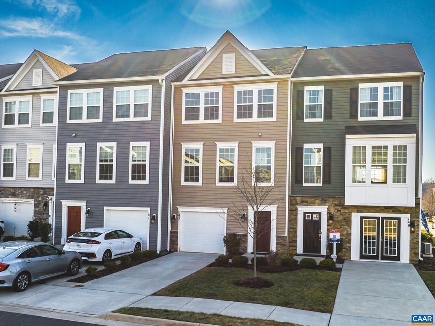 Southwest facing w/ Over 1,850 sq. ft. of finished living space one car garage on 3 levels. First floor offers bedroom with half bath and WI closet. Second floor mid-kitchen layout with 9' foot granite island, wood cabinets, cabinet pantry, stainless appliances. Luxury vinyl flooring on main level. Owners bedroom has dual vanities, step-in shower & large walk-in closet. Two more bedrooms and hall bath. W/D included in hallway Security system. HOA includes lawn care, snow removal.,Wood Cabinets