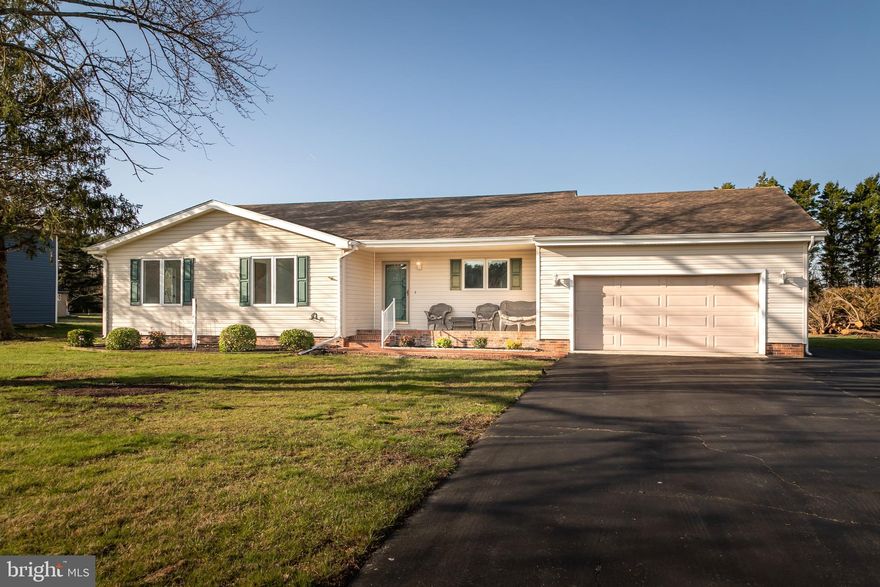 ** Open house, Sunday 3/24 from 12:30-2! ** Welcome to your new home in the charming Nevins Addition community! This meticulously maintained rancher offers three bedrooms, two bathrooms, and ample space for comfortable living. Situated in an established development, this property boasts convenience and community charm, including access to a nearby playground for outdoor enjoyment. As you enter, you'll be greeted by a welcoming front porch. Step inside to discover a spacious interior flooded with natural light, featuring a large kitchen with plenty of counter space and storage. Head to the master bedroom with its own ensuite bathroom and two closets (one walk-in!). Outside, a rear deck offers an ideal spot to enjoy the views of the expansive backyard. There is also a two-car attached garage including a workshop space. The home features brand new carpeting, solar panels, a paved driveway, and a lawn irrigation system. Don't miss the opportunity to make this Nevins Addition gem your own – schedule a showing today!