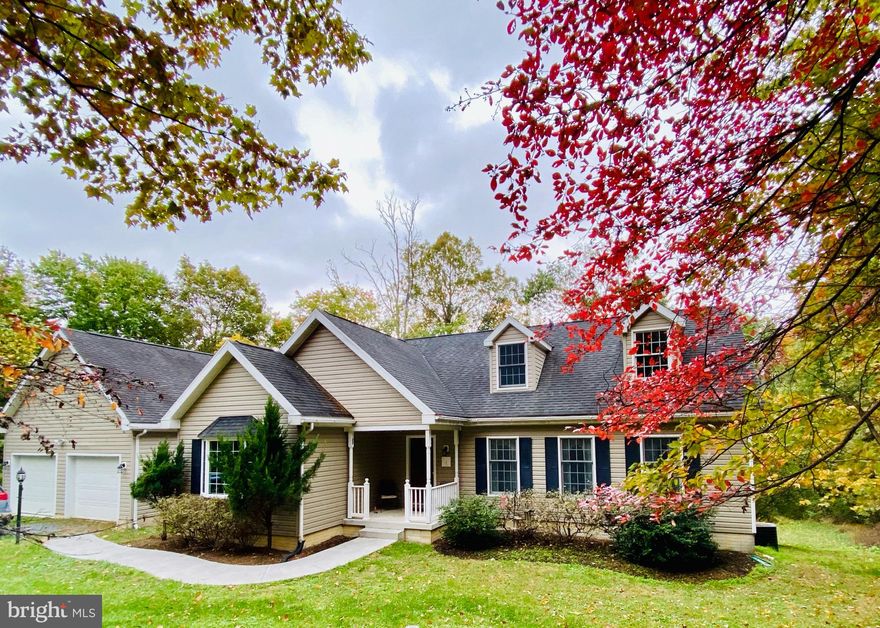 Welcome Home to Wild & Wonderful West VA.  Beautiful 5 acre lot to enjoy some morning Nature walks!! Sit on your front porch or go to the back deck with your favorite book and coffee.    Enjoy Your Holiday Baking in your Large Eat in Kitchen.  Home has been freshly Painted, and and new carpet in bedrooms upstairs.  Unfinished Basement would be a great place for a Game Room, Rec Room, or a Home Office.  There is a Brick Hearth and Wood Stove there ready for your finishing Touches.  Holidays no worries plenty of room for all inside and out.  Home is 1/2  mile off of Route 50,  secluded but not remote.  It could be yours for the Holidays, come visit.