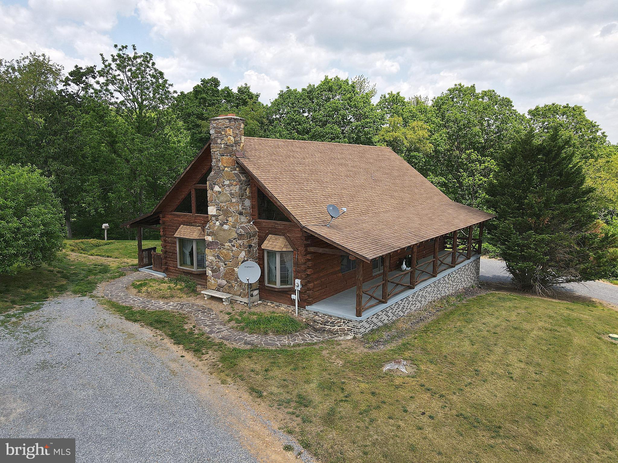 127 Beautiful unrestrained acres with log home with full basement & garage, barn, storage/machine shop combined. Choose from natural gas or wood heat, Very Private, Plenty of wildlife, 5 large hunting blinds, ponds, trails throughout the entire property. 35 acres tillable(rights for. hay harvest committed till the end of 2021) It would be hard to find a more beautiful setting.