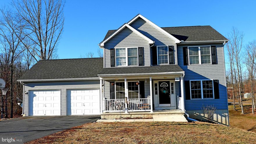 Lovely traditional home in great subdivision-Woodbridge.  All homes on large lots with mature trees.  Basement is almost finished drywall is up, bath is almost done with shower, sink and toilet installed--just a little work to add lots more sq feet to this home.  Nice fam rm with gas fireplace. Large Trex deck extends length of house.  Motivated seller.