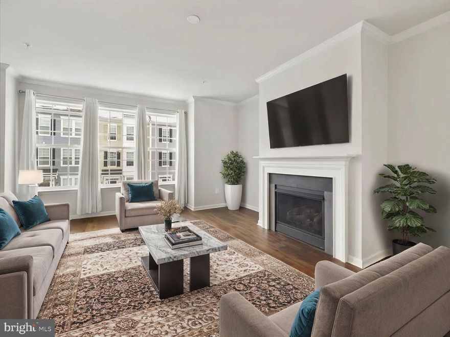 Nestled in the Spring Bank community, this townhouse offers everything you need! Built in 2019, the home features a one car garage, 3 fully finished levels of living space that backs to trees. Step inside to discover an inviting open floor plan. The living room is enhanced by a cozy gas fireplace, perfect for creating warm memories. The kitchen offers quartz countertops, stainless steel appliances, gas cooking and a large island with breakfast bar, ideal for casual dining or entertaining.  Enjoy evening on your deck which is conveniently located just off the dining area. Retreat to the primary suite, featuring vaulted ceilings, your private bathroom with a luxurious soaking tub and a walk-in shower, providing a spa-like experience at home. Two additional well-appointed bedrooms and a thoughtfully designed full bath offer comfort and privacy for everyone.  In addition the laundry is located on the bedroom level. Enjoy the serene outdoor space that backs to trees, providing a peaceful backdrop for relaxation on the deck. The attached garage and driveway offer convenient parking. One of the highlights of this home is the location situated near Clemson Corner and Market Square offering lots of shopping and dining options.  Experience the perfect blend of comfort and style in this delightful residence.