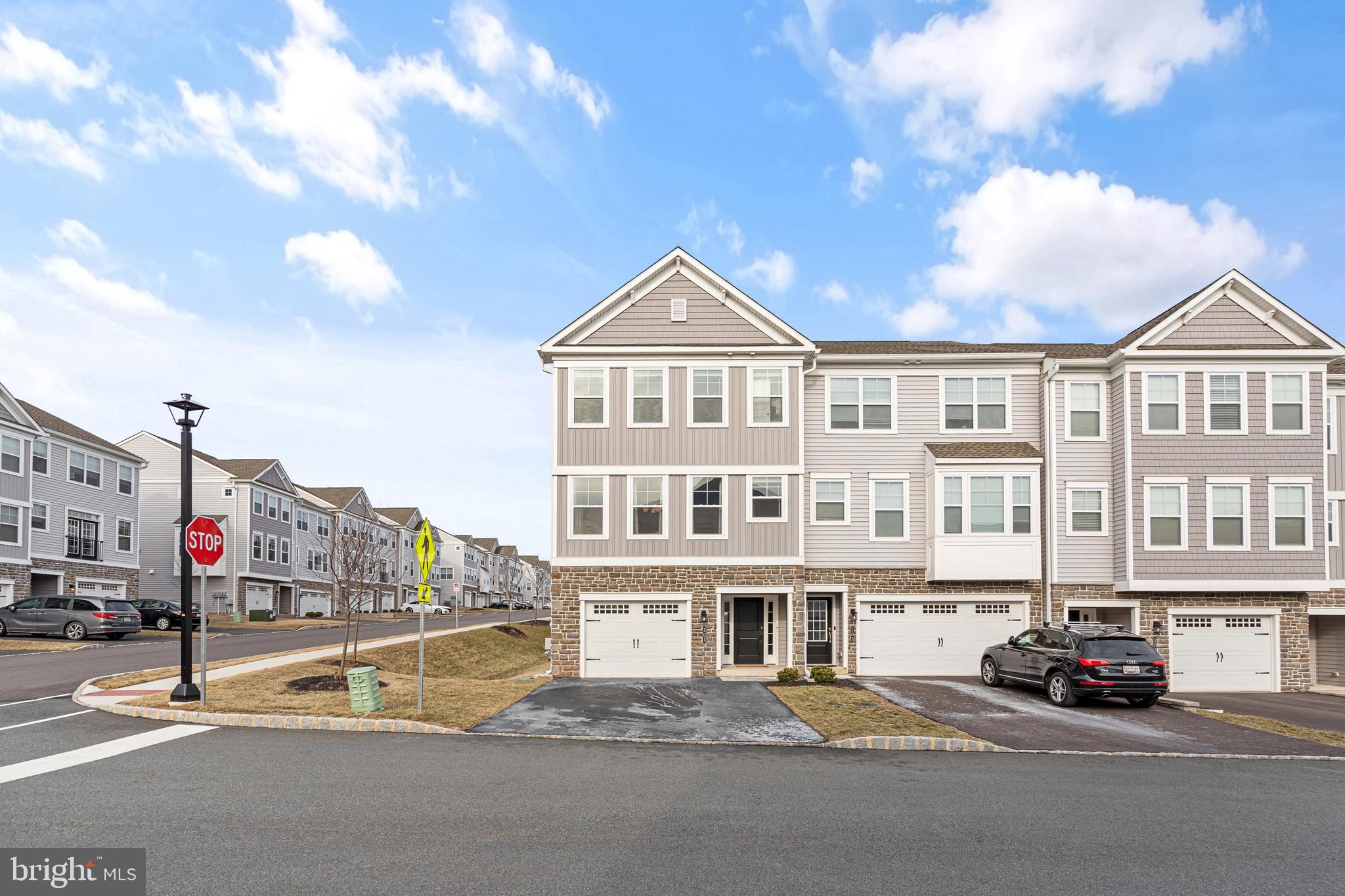 Welcome to 101 Larrabee Way, this beautifully designed, move-in ready townhome, is waiting for you to call it home. Built in 2021, this corner unit boasts 4 spacious bedrooms and 2.5 modern bathrooms, offering ample space for families of all sizes. The contemporary design and thoughtful layout create a warm and inviting atmosphere, while the convenient garage parking adds an extra touch of ease and comfort.
Step inside and you'll be greeted by an abundance of natural light that fills the open-concept living area, creating a bright and open atmosphere. The entire space feels open and connected, with a seamless flow between the living room, dining area, and kitchen.
The lower level offers a versatile bedroom with a walk-in closet, ideal for accommodating guests, creating a home-based office, or setting up a home gym. The main levels are graced with stylish 8” wide wood flooring that flows beautifully throughout. The 9’ wide kitchen island features elegant quartz countertops and fashionable cabinetry accented by under-cabinet LED lighting. The welcoming living space extends effortlessly to a rear deck, providing an excellent spot for outdoor relaxation and social gatherings. Ascend to the upper level to find two generously sized bedrooms, and a luxurious master suite with vaulted ceilings and custom finished walk-in closet!
Thoughtful modern enhancements, both aesthetic and functional, have been carefully integrated throughout the property. These updates include state-of-the-art appliances, smart home technology, energy-efficient fixtures, and elegant finishes. For year-round comfort, the home includes a built-in whole home humidifier.
Enjoy the outdoors with your grassy backyard, perfect for leisure and activities. This exceptional home enjoys a superb location within easy walking distance of Limerick Community Park, home to the popular Manderach Memorial Playground. Residents also benefit from access to the highly-regarded Spring-Ford Area School District .
This remarkable townhome won't last long! Arrange your private showing today to fully appreciate all the wonderful features of 101 Larrabee Way.
Upstairs, you’ll find two generously sized bedrooms, including a luxurious primary suite. Outside, enjoy a patio and grass backyard.
With its prime location, modern design, and functional layout, this home is a must-see. Schedule your showing today!