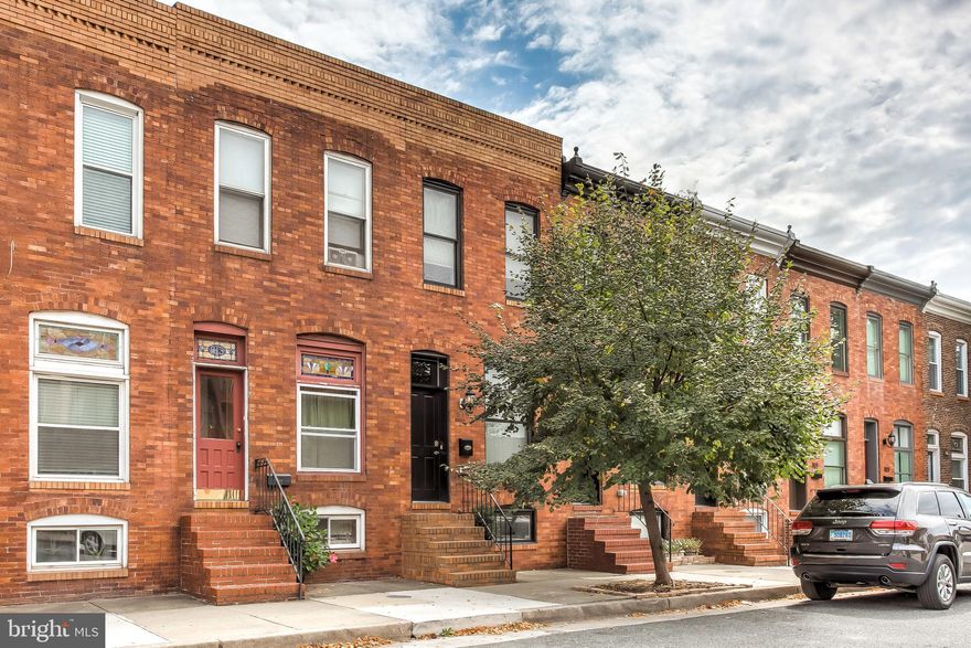 Gorgeous fully renovated Canton home with parking pad and 3 years left on CHAP! Open floor plan with exposed brick in living room, crown molding, hardwood floors, recessed lights and oversized window and transom above the front door. Upgraded light in eating area and pendant lights over kitchen peninsula. Gourmet kitchen with white cabinets, glass subway tile back splash, stainless steel appliances, granite counters, pantry cabinet and ceiling fan. Primary bedroom with en suite bath with stand up shower, two closets and tray ceiling with up lighting. Additional bedroom and hall bath on upper level. Easy access to roof top deck from hallway. Lower level includes a bedroom/family room with closet, full bath and laundry/storage area. Ample parking in front of home. Great location in Canton!