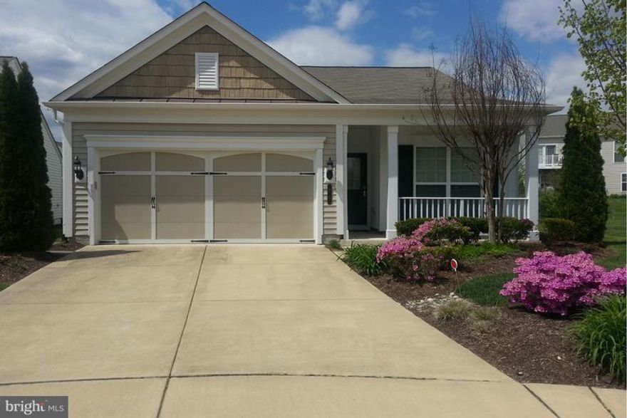 WOW, Price Reduction on this Beautiful, very well maintained 2bdrm/2bath home! SS appliances, corian counters and ceramic tile floor in kitchen and each bathroom has ceramic tiles with separate heating and heated floors! Walk out to brick patio!