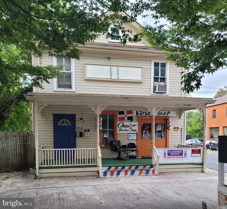 3 unit investment property.  Perfect opportunity for a new business owner occupant or investor.  High traffic volume on E. Diamond Avenue and close proximity to the MARC train stop.  The property is sold As-Is.