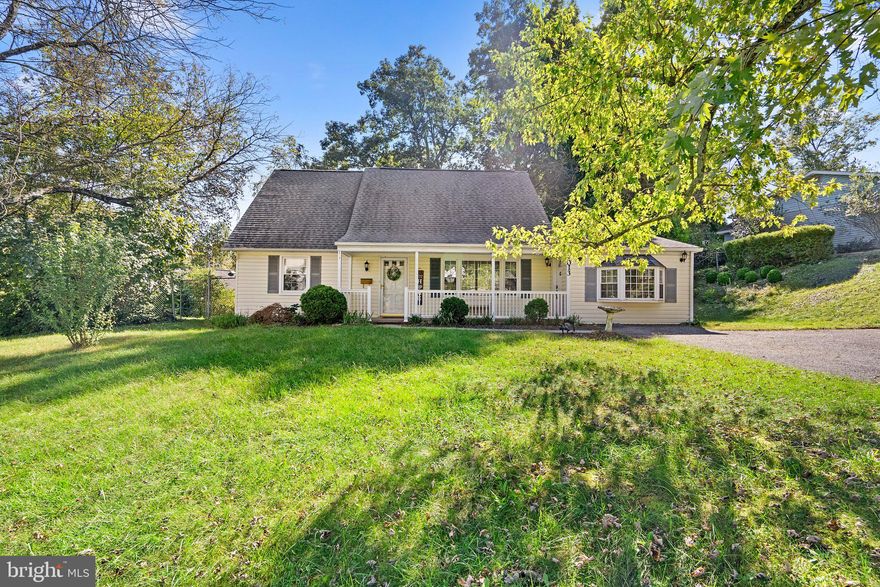 This Cape Cod in popular Whitehall at Belair offers classic architecture, a landscaped homesite, over 1,788 sqft, a covered front porch entry, beautiful hardwoods, and a high efficiency furnace and air conditioning. Step inside to find a spacious living room with a picture window, and a dining room bordering the kitchen with a bow window and a glass slider walkout to a large paver patio. Designed with a cook in mind, the kitchen features classic white cabinetry, plenty of counter and prep space, crisp white appliances including a 5-burner cooktop, and a view of the family room. Great for casual entertaining, the family room boasts a brilliant bay window, and great space for entertaining. Two bedrooms are on the main level and two bedrooms are on the upper level displaying a huge walk-in cedar closet, dormer architecture, and a full bath. Easy access to Washington, Annapolis, BWI airport, and only moments away from shopping, dining, and recreation. Welcome Home!