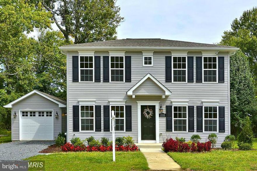 Gorgeous Home! Open Floor Plan..Custom Woodwork and Craftsmanship, Beautiful Kitchen with Granite Counter Tops, Hardwood wood Floors. Large open Great Room with Fireplace. Tiled Bathrooms. Craftsman Style home. Large Detached Garage. A Must See. Public Peer with boat slips. Community Beach. Fencing Allowance. Close to Historic Annapolis, Restaurants and Shopping.