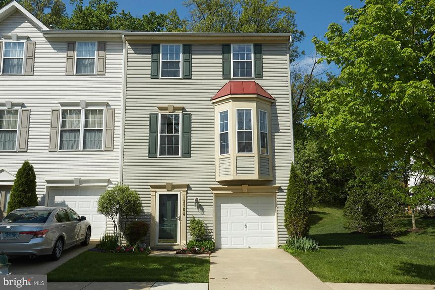 OH 6/8 1-4 PM.  Superb Value!  GORGEOUS, RENOVATED END UNIT GARAGE TH.  Stunning remodeled Kitchen (2008; cabinets, island, SS appliances, backsplash, quartz countertops, recessed lights) and Baths (2007; total remodel; jetted tub, quartz countertops, recessed lights), hardwood (stairs, main lvl, and upper hall), two bay windows.  LL Den/Office.  Large Deck(2011) overlooking trees.  A MUST SEE!!!