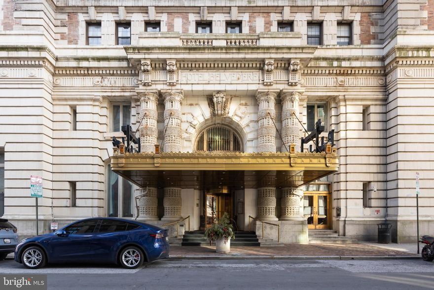 Welcome to The Belvedere, a beautiful 2-bedroom, 2-bath residence located on the 7th floor in Baltimore City. Freshly painted and currently being upgraded from carpet to hardwood flooring. This iconic historic building offers 24-hour lobby service for added security and convenience. Residents enjoy beautifully restored grand interior spaces, including elegant ballrooms, the John Eager Howard Room with pastoral murals, the iconic Owl Bar, the 13th Floor lounge and observation level, and a basement-level shopping arcade, all open to the public. Ideally located near banks, restaurants, and shopping.