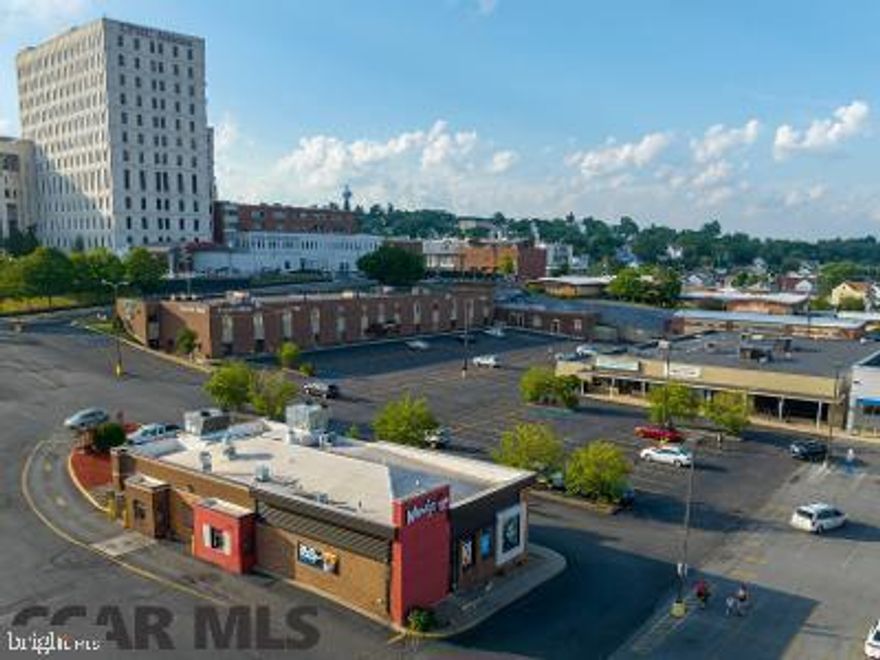 Fantastic opportunity to own high end office and retail space.  Includes Executive Hosue office building with approximately 41,000 sq. ft., Wendy's restaurant, additional office building.  Executive House features attractive entry, first and second floors.  Ample parking for all tenants, customers, near each building.  Included is the three unit, one story building known as 1304 Seventh Street.  Drug store is NOT included.  Currently three vacancies.