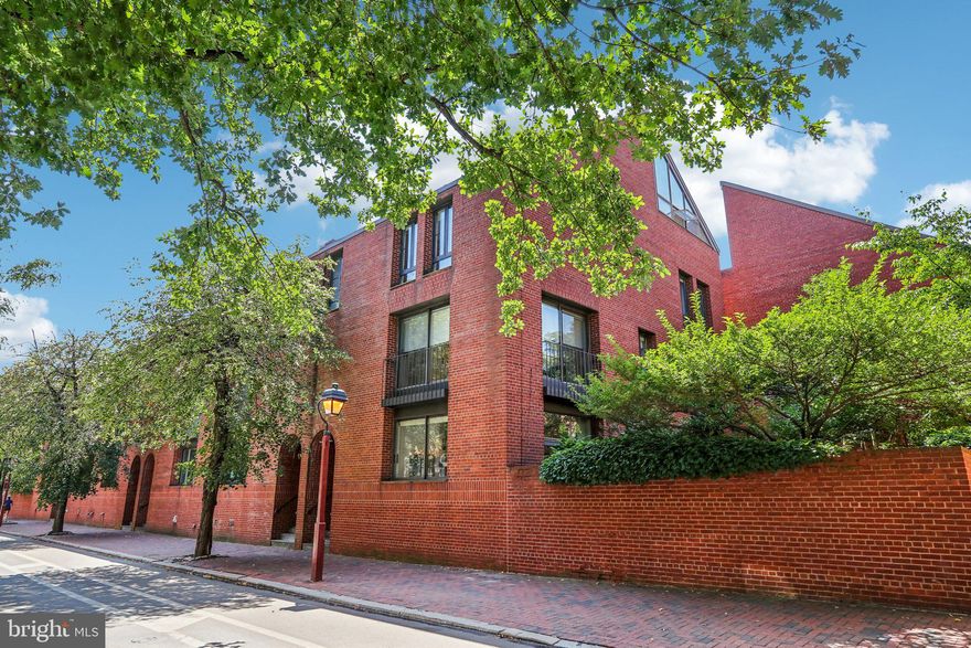 Extra-wide and spacious, light-filled corner townhome on one of Society Hill’s prettiest tree-lined blocks. Featuring one of the city’s larger, private landscaped patios—overlooking beautiful, historic St Peter’s Way. With ELEVATOR and one car on-site assigned PARKING included. Offers 4-5 bedrooms, family room, office, studio/bonus/play space/family space, 3.5 baths, plus a finished lower level.

High ceilings and hardwood floors. 3-stop elevator (1st through 3rd floors). The 1st floor has an open plan with bulthaup kitchen, dining area, and a living area with fireplace and double-height ceilings. Two sets of sliders to the tremendous rear yard. The 2nd floor offers a large family room and an even more spacious primary suite. The 3rd floor offers 2 bedrooms, and a 3rd room—large enough for bedroom plus office/sitting area. The 4th floor a huge and open flexible space with —dramatic with high ceilings and amazing light—could be bedroom, studio, office, and/or additional family space. Incredible storage throughout. 2-Zone HVAC (Hot water heat and Central Air).

Home is well maintained though needs cosmetic updates. The space, light, and volume are wonderful, and the garden is just A+ spectacular, with ample brick patio space for the best in Center City outdoor living and entertaining. As a corner home, the light is superb, and the high ceilings and big windows accentuate the radiance. Located in Cypress Square—Enjoy balanced light and views of historical architecture all day long. A+ location with a 98 WalkScore. Walk to all the great restaurants, cafes, and shopping of Society Hill, Old City, Washington Square, and all of Center City, including 2 blocks to the Head House Square Farmers’ Market and less than a half block to Three Bears Park. An outstanding home. Note No. 1: Parking is Space No 4 and is just steps from your patio door. In the McCall School CATCHMENT, and just two blocks to Saint Peter’s School.