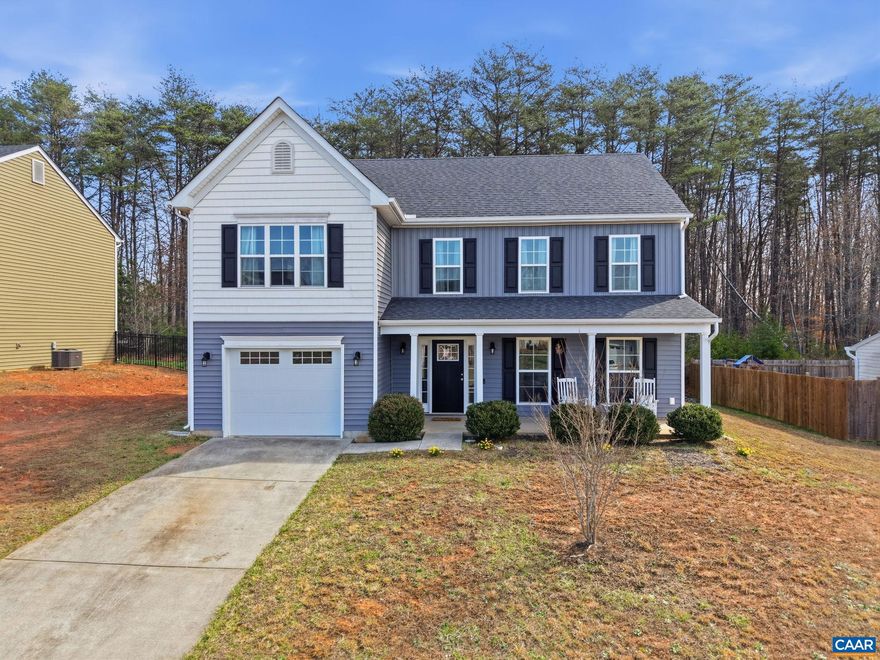 Conveniently located just outside the Town of Louisa, this 4-bedroom, 2.5-bath home offers comfortable living in a peaceful setting. The home features a functional layout with spacious bedrooms, including a spacious primary suite with room for a seating area, plenty of space for everyday living, and a one-car garage for added convenience. The kitchen is equipped with granite countertops and stainless steel appliances, while the living room showcases a rustic farmhouse accent wall that adds warmth and character. This move-in ready home also includes a washer and dryer for added ease. Enjoy a secluded, private backyard with newly planted trees and frequent wildlife sightings, adding to the natural charm of the property. Plus, the seller is offering $2,000 toward new carpet. Located just minutes from local shops, dining, and amenities, this home offers the perfect blend of quiet living and convenience.