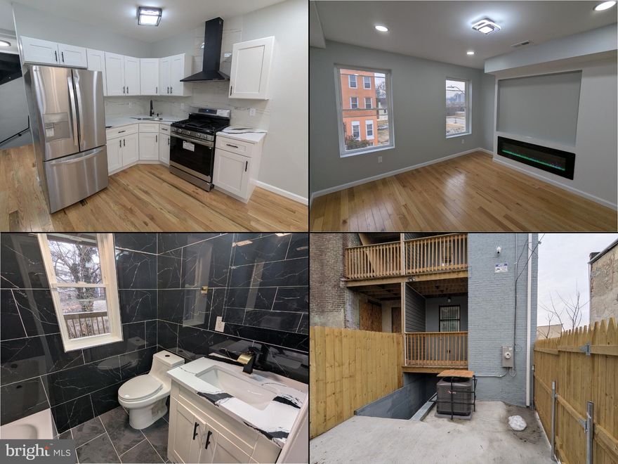 **Beautifully renovated 4-story end-unit Federal-style row home** featuring 3 bedrooms and 2 full baths and one half bath. This home offers hardwood floors throughout, quartz countertops, soft-close cabinetry, recessed lighting, and electric fireplaces in both the living room and primary suite. The main level includes a half bath and access to a newly built balcony with privacy panels. The second-floor primary suite features an ensuite bath, walk-in closet with built-ins, and a private balcony. The third floor includes two additional bedrooms with wardrobes and a full bath with a silent exhaust fan. Enjoy a private fenced backyard and a separate exterior entrance to the basement. Home includes updated fixtures, an alarm system with a security door, and high-end finishes throughout. Sellers also own the adjoining property and will be fully renovating it as well, improving the entire streetscape. Move-in ready in a convenient Baltimore City location.