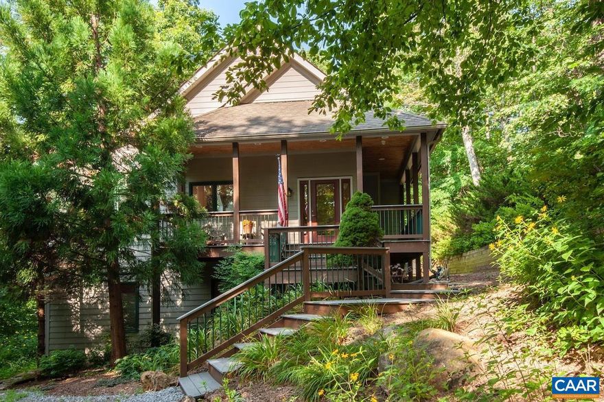 Amazing privacy bordering Shamokin Springs Nature Preserve with trails and bold stream that you can see and hear from the home/decks! So many things to love about this SIPs energy efficient Craftsman especially if you enjoy nature more than people; rare to view absolutely no one from expansive back decks (with hot tub!) and feel like you are in a tree house surrounded by woods, wildlife, and mountain trails. Ideal peaceful vacation getaway OR investment rental (all 4 Bedrooms are primary suites with private bathrooms) OR full time residence w/ garage. Recent improvements: Trane HVAC 2022, stone floor to ceiling fireplace with mesquite mantel 2021, leaf guards 2022, painting 2020, lower deck replaced 2018, garage 2020, and most appliances/fixtures/fans replaced. Features: 1st floor primary BR with cathedral ceilings and access to upper deck, lots of gathering places (living room, loft family room/den, and a rec room), spacious kitchen ( granite countertops, pantry, island, gas range with double oven, island with vegetable sink), vaulted wood-lined ceilings, hardwood floors, covered front porch and multiple decks (1,230+ sq ft outdoors), level driveway, fiber optic internet, security system. Tastefully furnished and sold turn-key!,Granite Counter,Wood Cabinets,Fireplace in Living Room,Fireplace in Rec Room