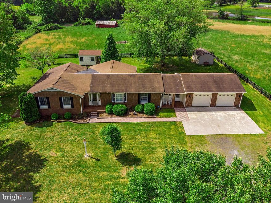 Wonderful 18+ acre property with pond, board fencing and outbuildings Well cared for rambler with amazing great room addition. Gleaming hardwood floors, beamed ceilings, kitchen with granite counters with lots of cabinetry, generous room sizes and over sized 2+ car garage. Convenient location close to 29,17 and 28 for commuters.