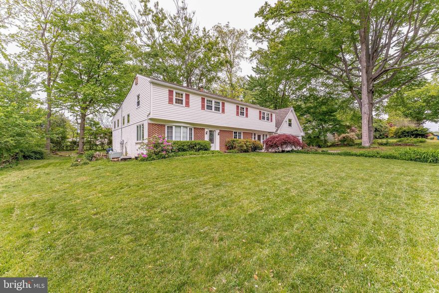 Welcome to 312 Penn Lane, a 3-bedroom, 2.5-bath split-level single-family home in the Glen Acres community of West Chester. As you approach, a two-car garage and spacious six-car driveway provide ample parking and convenience. The main level features a kitchen with quartz countertops, a center island, and stainless steel appliances, offering both functionality and style. This level also includes a family room, ideal for everyday living or entertaining, along with a convenient powder room. A breezeway from the kitchen adds flexible space that can be used as a sitting area, playroom, or additional living space. Upstairs, the second level includes a dining room with hardwood flooring, crown molding, and a ceiling fan, which flows into the living room featuring hardwood floors, crown molding, and a propane fireplace. A dedicated home office on this level includes hardwood flooring, exposed ceiling beams, wood wainscoting, and built-in cabinetry, creating a comfortable and functional workspace. The third level includes the primary bedroom with a ceiling fan and a spacious walk-in closet. The en-suite bathroom features tile flooring and a step-in shower. Two additional bedrooms, each with carpet flooring and ceiling fans, offer space for family or guests. A full hall bathroom with a tub and shower combination completes this level. The finished lower level provides additional living space with a rec room featuring ceiling beams and direct access to the backyard. The laundry room and home utilities are also located on this level. A finished room above the garage offers plenty of potential for a private office, media room or home gym. The fully fenced backyard offers plenty of space for relaxing or entertaining. Conveniently located near local shopping, grocery stores, dining, and entertainment, this home also provides easy access to downtown West Chester and Route 3. Don’t miss the opportunity to make 312 Penn Lane your new home.