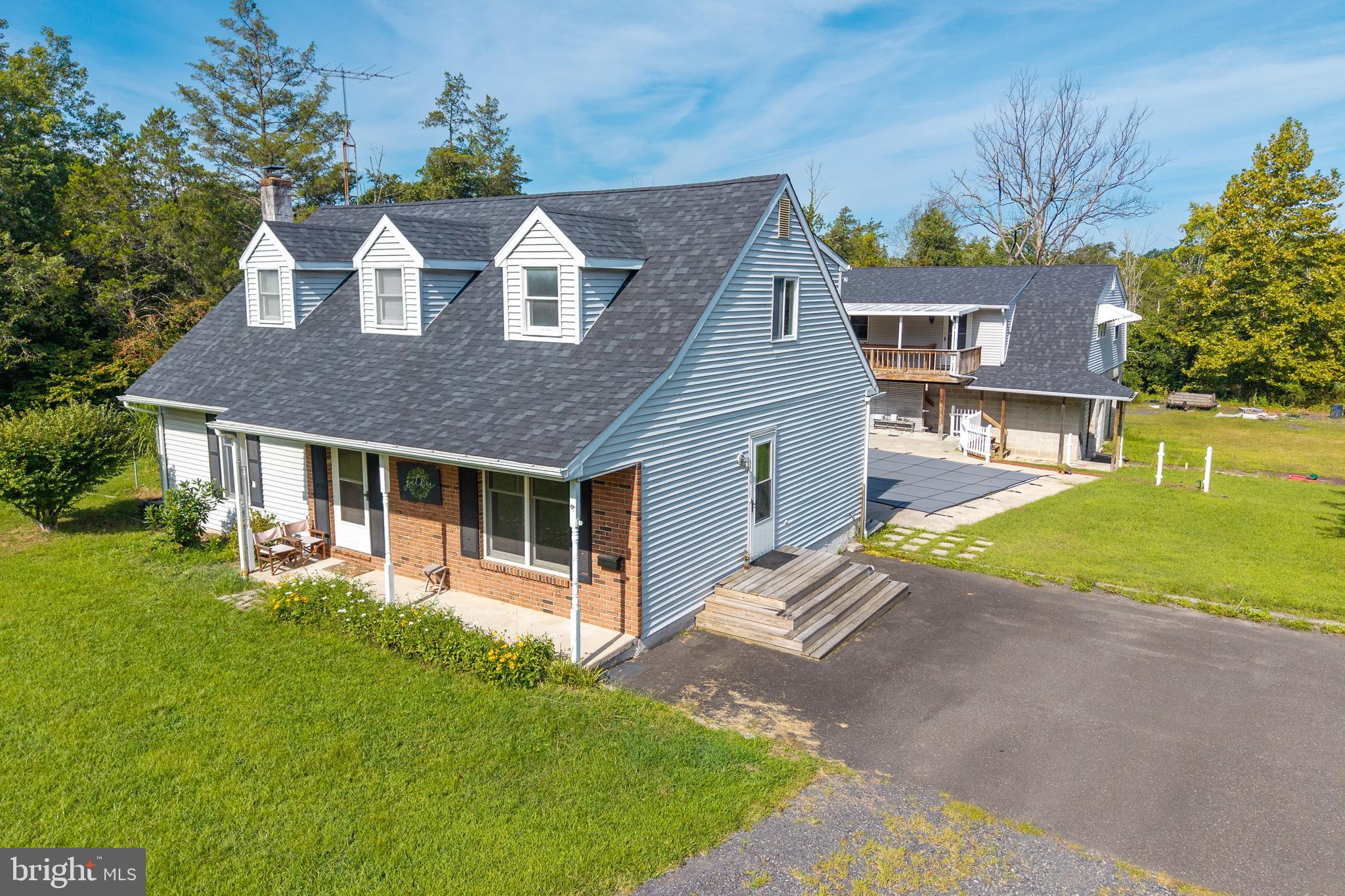 Nestled on a sprawling 3.69-acre lot, this Cape Cod-style home offers the perfect blend of comfort, space, and privacy. Built in 1985, it features 4 spacious bedrooms, 2 full bathrooms, and the convenience of main-floor laundry. A new roof was installed in 2023.
Spend summer days by your private in-ground pool, or make use of the oversized detached garage and multiple outbuildings—ideal for storage, hobbies, or a workshop. Above the garage is a spacious bonus area, historically used as an in-law suite for family. Buyers are encouraged to verify allowable uses with Marlborough Township. For added convenience, the property is equipped with electric and water hookups, plus a sewer dump for RVs and campers—making it perfect for travel enthusiasts or hosting guests.
Inside, the home exudes warmth and charm, creating a welcoming retreat. Conveniently located near recreational parks and with easy access to major roadways, you’ll enjoy both the tranquility of country living and the ease of commuting.
Don’t miss the opportunity to make this delightful property yours—schedule a showing today!