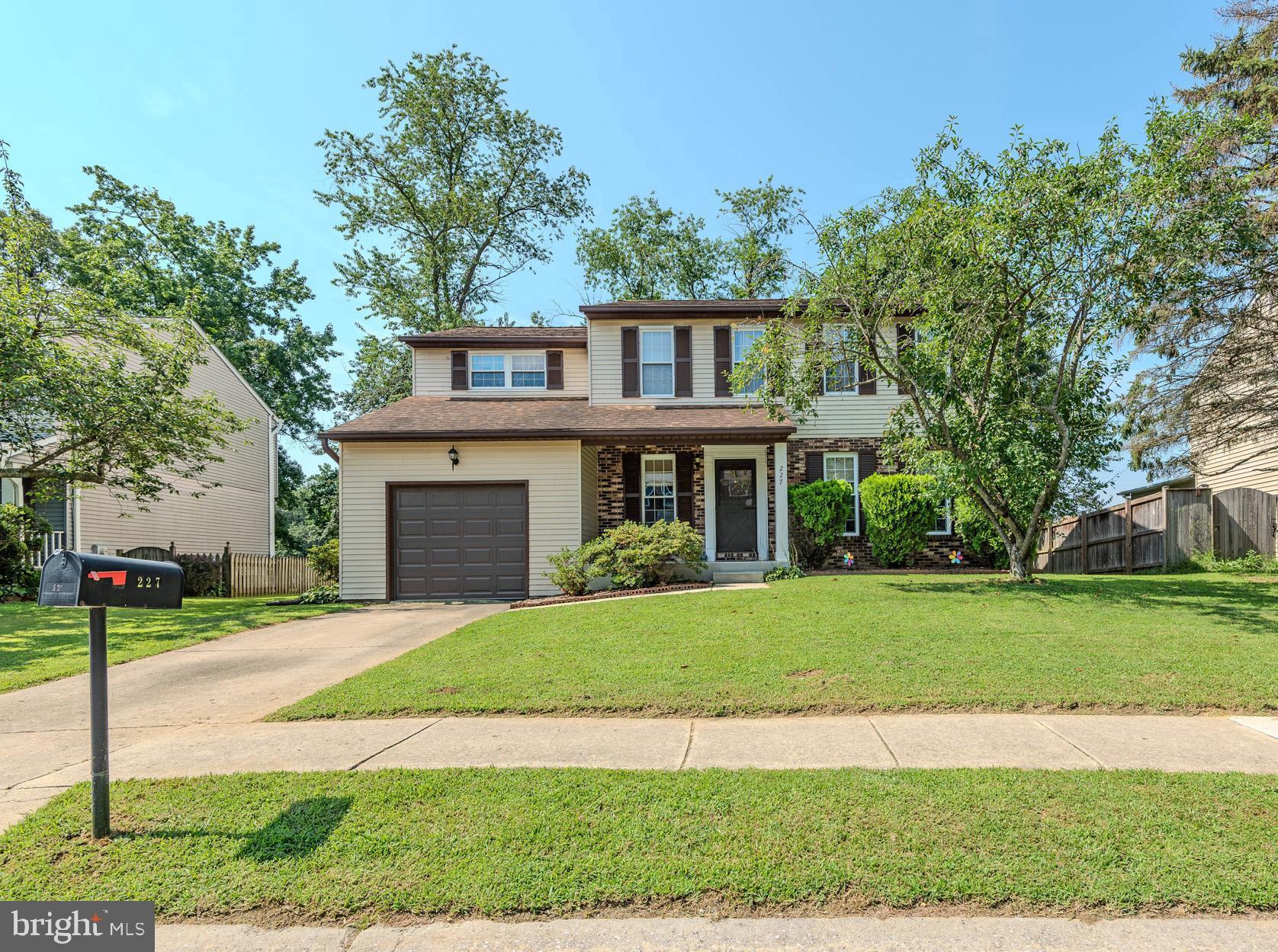 Welcome Home! This spacious 4-bedroom, 2.5-bath home in the Water Privileged community of Divinity Cove! This home has been lovingly maintained. From the moment you walk in, you’ll appreciate the open floor plan that creates a seamless connection between living, dining, and entertaining spaces. The main level is filled with natural light. The kitchen is perfectly positioned at the heart of the home, featuring sleek granite countertops, stainless steel appliances, and easy access to the deck off of the Family Room —perfect for outdoor dining or relaxing in your private fenced yard. Conveniences on the main level include large formal Living Room with separate Dining Room, a Powder Room and interior access to the one-car garage—adding practicality to everyday living. Upstairs, the oversized Primary Bedroom is a true retreat. The luxurious en-suite bathroom is a standout feature, boasting a frameless glass shower, modern tile finishes and two closets. Three additional spacious bedrooms and a full hall bath provide plenty of space for family, guests, or a home office. The Lower Level includes a finished half and an unfinished half basement with abundant storage space and endless potential for customization, not to mention the walk-out to the backyard. This home backs up to Severn River Middle School. With a commute that short, your child has no excuse to be late! Tucked within a charming water-oriented community with shared pier access and kayak storage, this home offers the perfect blend of comfort, functionality, and location. Ideally minutes to Annapolis and situated to Washington D.C., Baltimore and BWI Airport you'll enjoy easy access to major commuter routes, shopping and restaurants while still coming home to a peaceful, private setting. MUST SEE!