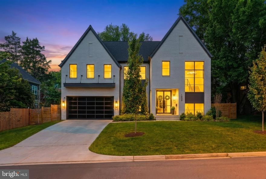 Open Houses this Saturday & Sunday!

Elevate your lifestyle in this magnificent Modern Tudor masterpiece! The home offers an impressive 6 bedrooms and 6.5 baths, featuring a convenient 8' tall cab elevator servicing all floors. As you step inside, an inviting sun-filled formal entry beckons, setting the stage for the opulence that awaits. The entire first floor boasts exquisite white oak wire-brushed engineered hardwood floors, creating a seamless and sophisticated canvas for the home.

Custom steel railings with horizontal steel pickets infuse a modern aesthetic and guide you through this architecturally distinguished residence. With 10-foot ceilings on the main floor, the sense of space and grandeur is undeniable, while the basement and upper levels maintain a comfortable 9-foot ceiling height, ensuring a harmonious flow.

For culinary enthusiasts, the chef's dream kitchen package is nothing short of extraordinary. Adorned with beautiful custom maple cabinets in a custom paint color, stacked wall frameless cabinets that reach the ceiling, an oversized waterfall island with a convenient prep sink, and top-of-the-line Sub-Zero and Wolf appliances, this kitchen is a true masterpiece. The main level further impresses with a generously sized dining room, a spacious living room, a screened-in porch, and a flexible room that features an ensuite full bathroom, providing the versatility to serve as an additional bedroom or a study.

The primary suite includes a luxurious custom closet, and the master bathroom boasts a freestanding soaking tub and a generously sized custom shower. A heated towel rack adds a touch of comfort, transforming daily routines into moments of indulgence. Three additional bedrooms, each with ensuite baths, provide unparalleled comfort and convenience.

The lower level is a haven of entertainment, featuring an au pair suite with a full bathroom, an open theater/rec room, an exercise room, and a billiard room, ensuring there's something for everyone to enjoy. The mixologist-inspired full bar is the perfect space for hosting memorable gatherings.

This home has been meticulously designed with extensive phone, data, HDMI, and surround sound capabilities, along with a 3-zone Wi-Fi NUVO Sound System, perfect for the tech-savvy homeowner. Your peace of mind is ensured with the premium security system package, including an 8-zone CCTV system with remote viewing.

A beautifully landscaped yard completes this property, featuring a custom fencing that enhances both privacy and aesthetics. Welcome to a new standard of luxury living, where contemporary aesthetics meet practical functionality to create your dream home.