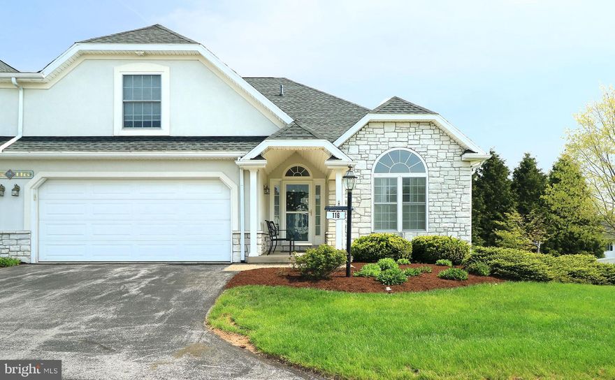 Easy and elegant living at its best can be found at 3296 Sheller's Bend Unit #116. This lovely 1.5 story condo features a classic serene color palette, beautiful hardwood floors, and lovely updates throughout. Located in desirable Cobble Creek Manor, you'll appreciate the extensive condo inclusions and access to the clubhouse. A great home for entertaining, you'll love the soaring ceilings of the vaulted living room with two sided fireplace perfect for cozy evenings with your loved ones. The well appointed kitchen features granite countertops, tile backsplash, ceramic tile floors, stainless steel appliances, bifold pantry, and lots of cabinetry for all of your culinary needs. Enjoy delicious dinners in the charming dining area or sunny afternoons sipping lemonade in the fabulous sunroom that also benefits in the winter from the other side of the two sided fireplace; all seasons you'll love this functionality of this sweet space. Working from home? You'll love the beautiful front study with glass French doors and hardwood floors. At the end of the day slip away to the spacious first floor primary suite with tray ceiling bedroom with hardwood floors, sitting area, walk-in closet with built-in drawers and shelving, and beautiful private bath with updated walk-in tiled shower with stone floor & rain shower head, dual vanity, jetted tub, ceramic tile floors, high ceilings, and linen closet. You'll also appreciate the convenience of a first floor laundry closet and half bath giving you the option for one floor living. Up the stately open staircase, you'll discover a great space for your loved ones with a spacious bedroom, walk-in closet, private bath with walk-in shower and two towel storage closets, and a finished storage closet/craft room with built-in desk. The lower level will delight your guests with a huge walk-out family room with plush carpet, lovely bedroom with egress & walk-in closet, and lovely full bath with glass tile shower & tile floors. You'll appreciate the extra storage space of a large unfinished area with workshop. The ease of your days is enhanced by the comprehensive condo association; monthly fee includes: lawn care, snow removal, cable tv, exterior building maintenance, high speed internet, sewer, washer, trash, clubhouse w/ fitness center access, and all common area maintenance. Located just at the edge of the borough, you'll love the quick access to campus and downtown as well as the neighborhood walking/biking paths, lovely Orchard Park just down the road, and a sweet community feel. Come and take a look today, you'll be home before you know it!