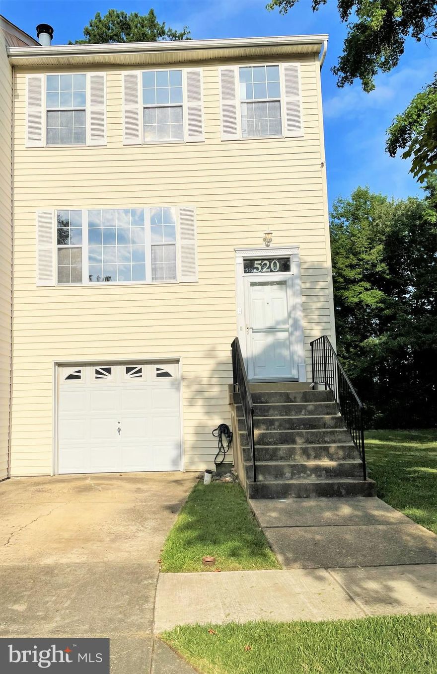 This lovely end unit townhome in Largo Woods features 2 master bedrooms, 2 & 1/2  renovated bathrooms, a separate living room  & dining room, a kitchen with stainless steel appliances, beautiful hardwood floors, brand new carpeting, and a fully finished basement with fireplace, and a one-car garage. This home is close to everything,  shopping, restaurants, a hospital, a public library, and transportation including the metro. The home shows very well. Please call showing services for instructions and leave a card.