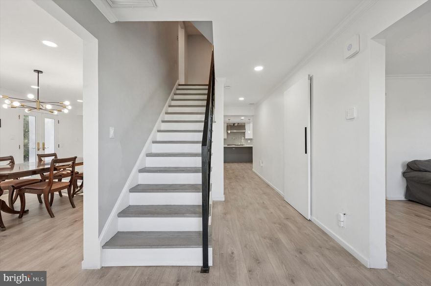 Welcome to 115 Summit Lane, a gracious brick colonial nestled in the heart of Bala Cynwyd’s most walkable and connected neighborhood. Just one block from Montgomery Avenue, this charming home offers timeless elegance and modern comfort in a serene, community-oriented setting.
Inside, light-filled living spaces flow seamlessly from the formal dining and living rooms—each rich with traditional detail and warmth—to a stunning modern addition anchored by a spacious brand-new chef's kitchen and great family room. Skylights, a wall of windows, and garden views create a seamless connection with nature.
The second floor boasts a rare, private primary suite featuring cathedral ceilings, a gas fireplace, and a luxurious spa-like bath with walk-in shower, skylight, and expansive dressing room. Three additional bedrooms, including one en-suite, and a third-floor loft with full bath provide generous accommodations for family and guests.
Additional highlights include a finished lower level, a brand new mud/laundry room with ample storage, private driveway with EV charger, and lush outdoor living spaces. Located from shops, restaurants, and beloved local institutions, this home offers the perfect blend of privacy, community, and convenience.
115 Summit Lane isn’t just a home—it’s a legacy of warmth, celebration, and connection.