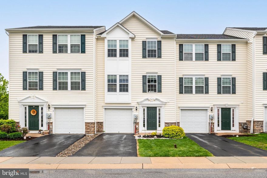 Low-maintenance living at Round Hill! This wonderful 3 bedroom 2.5 bathroom townhome is situated in a vibrant neighborhood, located conveniently near Route 30, with access to dining, shopping, and more! As you enter through the front door, there is a spacious foyer with powder room, access to your garage, and additional large storage space or future flex space. On the second level, you are greeted by the versatile kitchen, living, and dining space with natural light at every turn. Off of the kitchen there is an expanded breakfast nook with beautiful views of your back deck and peaceful nature. The top level offers a large primary suite with a walk-in closet and oversized bathroom, in addition to two guest bedrooms and another full bathroom.  There's plenty of space for everyone to unwind, or even an in-home office. 4 Tuxford is freshly painted and ready for you to move right in!