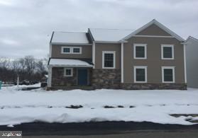 Custom model in the Gorgeous treed setting of Mulberry Ct. with dual cul-de-sacs by acclaimed EG Stoltzfus Homes.