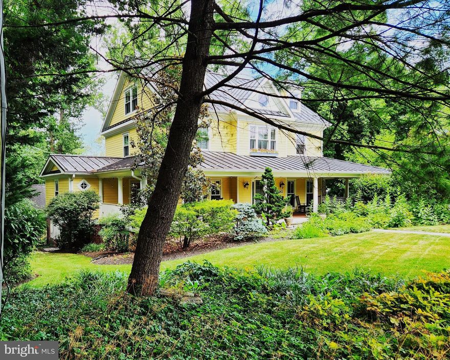 Located in the heart of sought-after Franklin Park, just over the Arlington line with access to exceptional
Fairfax schools, sits this gorgeous wooded half acre property enhanced by magnificent gardens and
mature landscaping. Designed by award-winning architect Robert Mobley, this absolutely stunning
modern interpretation of a classic four-square farmhouse offers its family exceptionally beautiful and
comfortable spaces. It was scrupulously constructed with materials that endure (like Marvin
windows/doors, Hardie cement siding and a standing-seam metal roof) and has been meticulously
maintained. You are welcomed by a spacious wrap-around, covered mahogany porch that previews the
sense of calm, warmth, and charm to be found inside. From the central foyer are gracious living and
dining rooms with arched entries, the start of the double-landing central staircase, and the entry to the
spacious open kitchen/dining and family rooms. Cooking will always be a joy with the ultra-luxe
Thermador fridge, six-burner Wolf stove/oven with pot-filler faucet, separate under-counter ice maker,
two sinks, and well-placed Decora cabinetry. The FR is highlighted by a natural stone wood-burning
fireplace and a recessed wall unit housing a 55” TV with Klipsch audio enhancements. Triple French
doors provide both glorious vistas and access to a huge (just refinished) Ipe mahogany deck
overlooking the beautiful private rear yard; what a great gathering place! Also on the main level are
two offices, one with its own entry from the front porch and one with shelving doubling as pantry
space, and a powder room. Level two has two corner bedrooms with ensuite baths, a corner primary
BR with a balcony, two walk-in closets and two luxurious marble bath areas (one an exercise room with
extravagant Kohler Infinity tub), and a laundry room with new top-tier GE appliances. Level three has
two huge (13.5’ x 25.5’) bedrooms, a full bathroom, and a cozy reading nook. The walk-out lower level
is truly exceptional: a full apartment (with a separate outside entrance) with a full kitchen, dining and
living areas, a bedroom, and full bath; a wood-paneled club room with a full bar with a sink and
wine/beverage fridge accented with a handsome stone wall; a Kohler powder room; a just-painted
laundry room with an oversized pet-washing sink; a three-section 608 sqft. conditioned storage area
with new floor coating. One section houses the equipment for the NuVo “Concerto” whole house audio
and Panasonic business telephone systems and the control centers for the rarely found but highly-
coveted heating systems. Encased in cement below each floor are copper water lines connected to a 9-
zone hydronic hot water radiant heating system powered by a Weil McLain “Ultra” aluminum heat
exchange gas boiler; this system provides gentle, comfortable, and efficient warming without noise or
dust/allergens. Hot water is provided throughout by two high-efficiency Rinnai tankless heaters with
recirculating lines/pumps. Even the air cooling in this home is rare, special, and coveted: two high-
efficiency Unico high-velocity, multi-zone heat pump systems. From the lower-level foyer door is a
covered breezeway to the 619 sqft. detached garage, which was just fully finished including an epoxy
slip-free floor coating. Besides the 2 oversized parking spaces is a separate area, great for cycles, yard
equipment, or a workshop, with its own overhead door; the garage has its own radiant floor heating
system and plumbing rough-in for a future bath. For extra protection and peace-of-mind, this home
was pre-wired with a ProTran switch block via an outside connection for a portable generator (deluxe
Yamaha unit conveys) to power selected circuits, and a new sophisticated Vector security system was
just installed. This home is  ready for immediate move-in; everything you see will convey. Come
see why serenity, space, privacy, comfort and beauty are the hallmarks of this truly remarkable home.