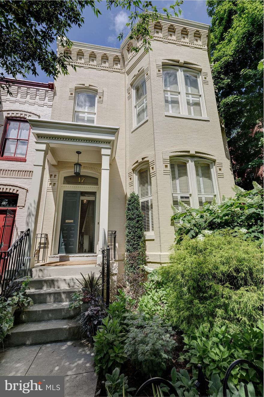 OPEN SATURDAY AND SUNDAY 6/11 & 6/12, 1-3PMA rare Capitol Hill Classic!  Grand, yet comfortable.  Updated, yet timeless.  Quality craftsmanship and a curator’s eye are evident throughout this peerless home.  The beautifully and lushly landscaped wrap-around garden suggests a secret Shangri-La, hidden in plain sight!  Soaring 12’ ceilings embellished by beautiful plaster moulding.  Mellow wood floors.  Entertain effortlessly whether it’s an intimate dinner party or an indoor / outdoor gathering for a hundred people.  The screened porch off of the clubby sitting room at the rear of the house is straight from the pages of Veranda magazine.  If there’s a more pleasant place on the Hill to while away a summer afternoon with friends sipping iced tea, then we haven’t seen it!  The family chef(s) will delight in the layout and space to be found in the kitchen, complete with a butler’s pantry.  At the end of the day, retreat to the second floor, with bedrooms aplenty.  The front bedroom boasts an oversized east-facing bay window and elegant fireplace.  The two middle bedrooms share a delightful side porch overlooking the garden.  The rear bedroom abuts a spa-like bathroom.  The lower level has been renovated as a guest suite or gathering room with a side entrance, full bathroom and laundry room.  Plentiful additional storage included.  This is clearly a home full of fond memories past, present and still to come.