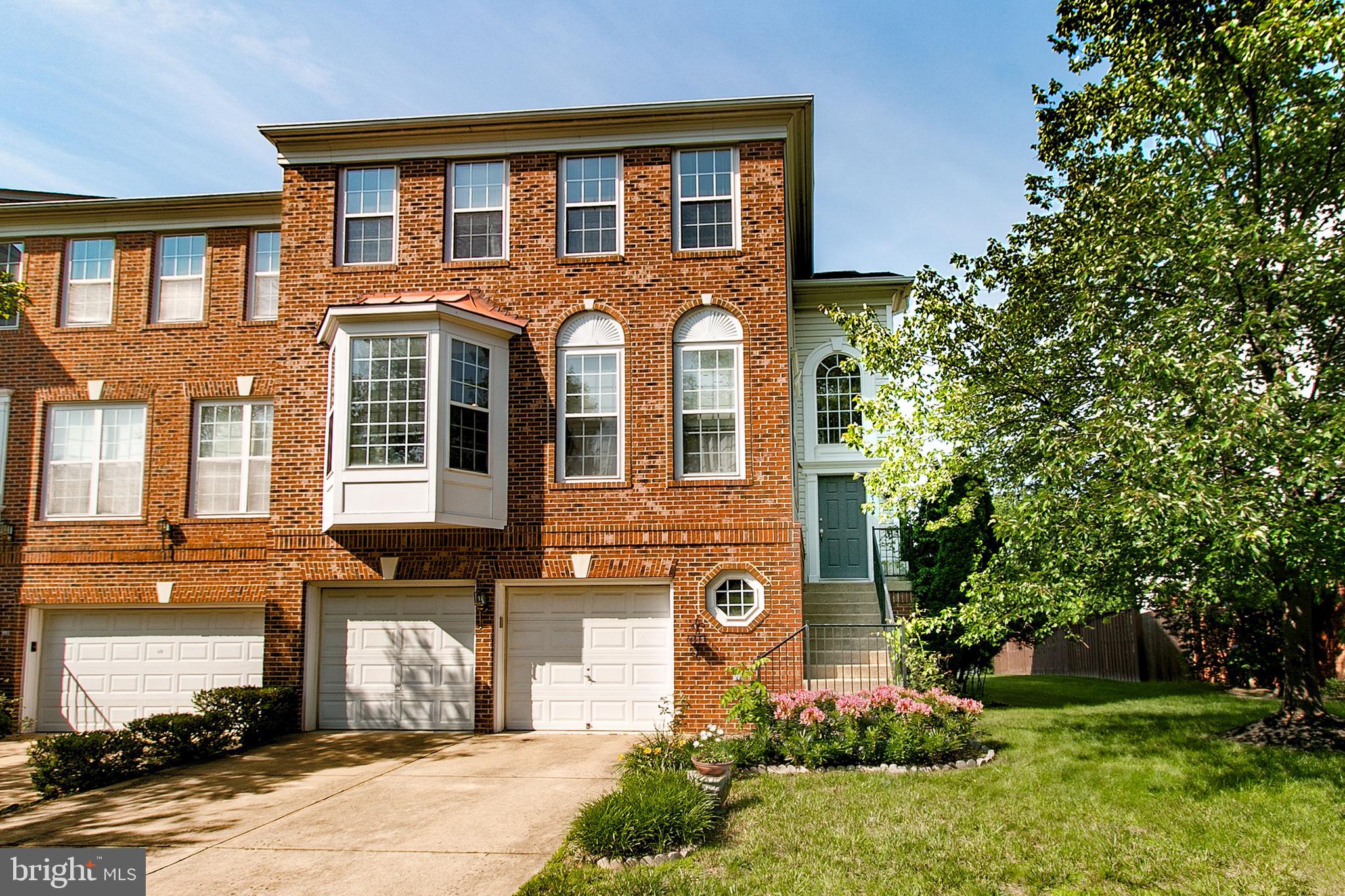 Welcome to this beautiful and spacious, three-level, 2-car garage, brick-front, end unit townhome in the desirable Cascade Park/Tall Oaks Community of Sterling that has 4 bedrooms, 3.5 baths, and over 3,000 SF of wonderful space. You will find this home is just perfect for both entertaining and comfortable living. The main floor has hardwood floors throughout and boasts a gourmet updated kitchen, a family room with a cozy gas fireplace, a dining room, living room, den/office space, and a half bath. The upper level also has hardwood floors throughout, and 3 bedrooms and two full bathrooms. The luxurious Primary Suite on this level has a tray ceiling, a large walk-in closet, and features a spacious ensuite bathroom with a soaking tub, dual sinks and a separate shower. The lower level is carpeted and is a versatile space with a rec room, bedroom, and a full bath making it ideal for a guest space, a game room, or for whatever suits your needs. This wonderful townhome backs to woods and a biking/walking trail, is centrally located near shopping and restaurants, and is just minutes from Routes 7, 28, and the Dulles Access Road. Schedule an appointment to see this beautiful and spacious home today.