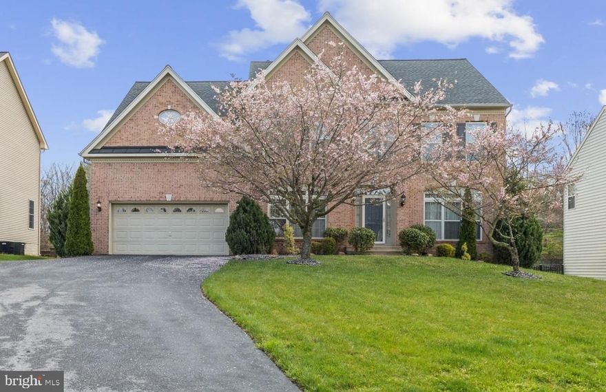 Nestled in the serene South-Western enclave of Howard County, this colonial masterpiece boasts a prime location with seamless connectivity to bustling city centers like Washington D.C., FDA, APL and NSA. The residence greets you with a majestic two-story foyer, adorned with pristine ceramic tile flooring, leading to an expanse of over 5,000 square feet of elegantly finished living space with 9 ft ceilings on main and lower levels. The heart of the home shines with a gourmet kitchen, complete with lustrous granite countertops, a vast array of cabinets, and a commodious pantry, all resting atop stylish ceramic floors. The adjoining family room, with its sophisticated crown moldings and a refined gas fireplace, provides a warm haven for relaxation. French doors open to reveal a maintenance-free Trex deck and a beautiful brick patio, overlooking a secluded backyard sanctuary where children can frolic with abandon. Ascend through the elegant to the upper echelon where four generously proportioned bedrooms await, accompanied by three full baths, including a palatial owner's suite with a luxurious en-suite bathroom, featuring dual vanities and a tub and a shower for the utmost convenience. The fully finished lower level unfolds into an expansive recreation room and an additional den, perfect for hosting gatherings and creating cherished memories. This architectural gem represents not just a house, but a dream abode ready to be claimed.