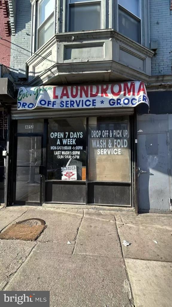 Property zoning CMX2. Property sells business and building. 1st floor Laundromats sells including all applicants and business. 2nd and 3rd floor two apartments.