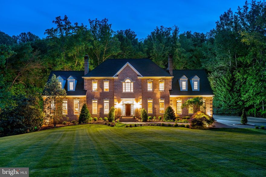 FINALLY - the home you’ve been waiting for! Welcome to 2604 Hannah Farm Court. Stunning Georgian architecture blends seamlessly with countless top-of-the-line designer finishes to offer a timeless aesthetic for peaceful modern living. The home sits on a large lot, set dramatically back with a long driveway and overlooking a meandering stream winding its way through towering trees. Step inside and be greeted by a breathtaking interior, including five-inch plank floors, 10’ ceilings, architectural details, and freshly painted calming colors throughout. The finishes are exquisite, yet simple to the eye, creating a comfortable charm amidst efficiency and functionality. The chef’s kitchen boasts farmhouse-style cabinetry, premium appliances (Sub-Zero, Thermador, Viking), and a stunning 10” Carrara marble island that anchors the home. Flanked by dual family rooms – a sun-drenched morning room on one side, and another off the kitchen for keeping an eye on the kids, there’s space for everyone. The deck off the kitchen provides access to the lower patios and pool while enveloping the property in the tranquility of the surroundings, which includes the spectacular renovated pool that will become your ‘happy place’ during DC’s steamy summers! Access the second deck off the sunroom and dining room via 2 of the six sets of mahogany French doors for even more opportunities for al fresco dining and entertaining. With six bedrooms in total—and offering a rare five bedrooms on the upper level—this home offers plenty of space for your loved ones and guests. All bedrooms have ensuite bathrooms (with 2 sharing a Jack & Jill). The enormous master suite boasts a separate sitting room, his & hers large closets, and a new bathroom including a dramatic soaking tub, custom barn-door glass shower, radiant floor heating, towel warmers, and private laundry. The fully finished walkout lower level houses the final bedroom suite and provides ample space for work, exercise, entertaining guests, or hosting a movie night with the family. When it's time to relax and unwind, you can curl up by one of the three cozy fireplaces - gas and wood burning- located throughout the home. An updated irrigation system services the front and back yards and new landscape lighting creates an elegant presentation of the estate in the evening. The home even offers an Invisible Fence around the whole home perimeter, so your dog can run free without running off! With thoughtful designer details throughout and amenities such as laundry sets on all 3 floors and a Tesla charger installed in the 3-car side-load attached garage, this home is sure to impress even the most discerning buyer. And the best part? You're a stone’s throw from all the amazing experiences that the DC metropolitan area has to offer. Quick and easy ‘back-way’ access can be found in all directions – Vienna and Reston Metro Stops, I-66 (HOV lanes now open!), the town of Vienna, Dulles Expressway… all are ‘through the woods and around the corner via some of the most beautiful roads in the County. Schedule your private showing today and experience the modern living, elegance, and sophistication of 2604 Hannah Farm Court for yourself! *Plat available in MLS docs section.