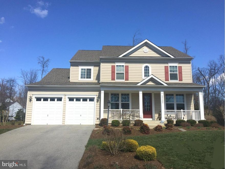 Gorgeous spacious colonial style home on over 1/3 acre lot.  Over 3000 fin sq ft. A kitchen that any chef will love w/ granite, stainless applian, lg island that overlooks the family room.  Formal living/dining area. Open floor plan with tons of natural light.  Unfin basement awaits your touches  Lovely back yard w/paver patio backs to trees Convenient to park, shopping, NAVAIR & Solomons Island