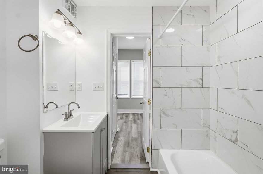 Welcome home to 206 S Hilton St. This fully renovated 4 bedroom 2 full bathroom townhome is ready for its new owner.  From top to bottom this home has been updated, to include roof, HVAC, plumbing, electrical, kitchen, bathrooms, flooring, windows and newer SS appliances.  This property also has an unfinished basement, and access is gained from the external rear of the home. This is a truly move in ready property, Book your showing today!